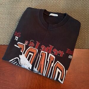 Our Legacy Black Sweatshirt with Red and Orange Graphics